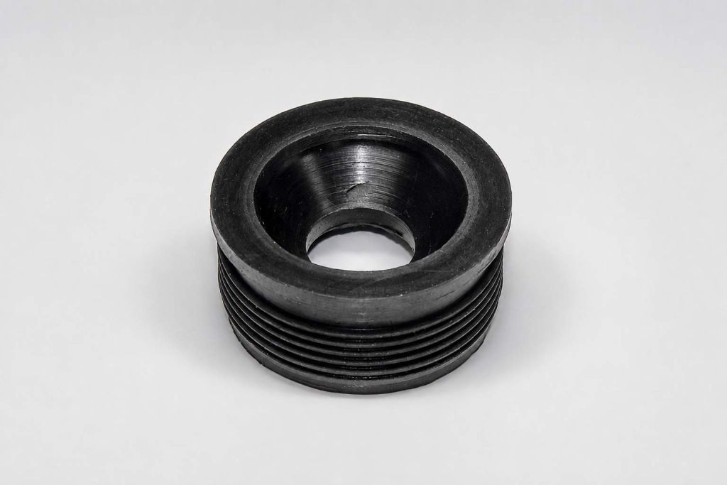 Vulcanized rubber length compensator spacer