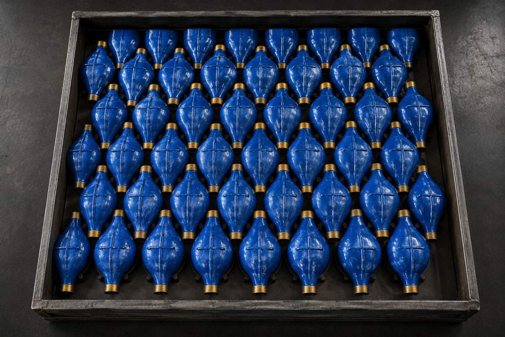 Plastic hydrant cap couplings packed in a crate