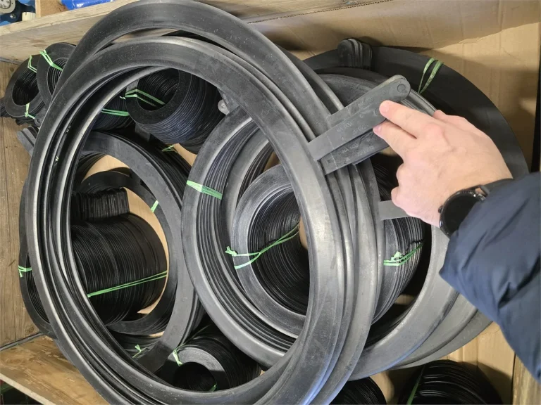Bundles of vulcanized rubber flange gaskets in the production area
